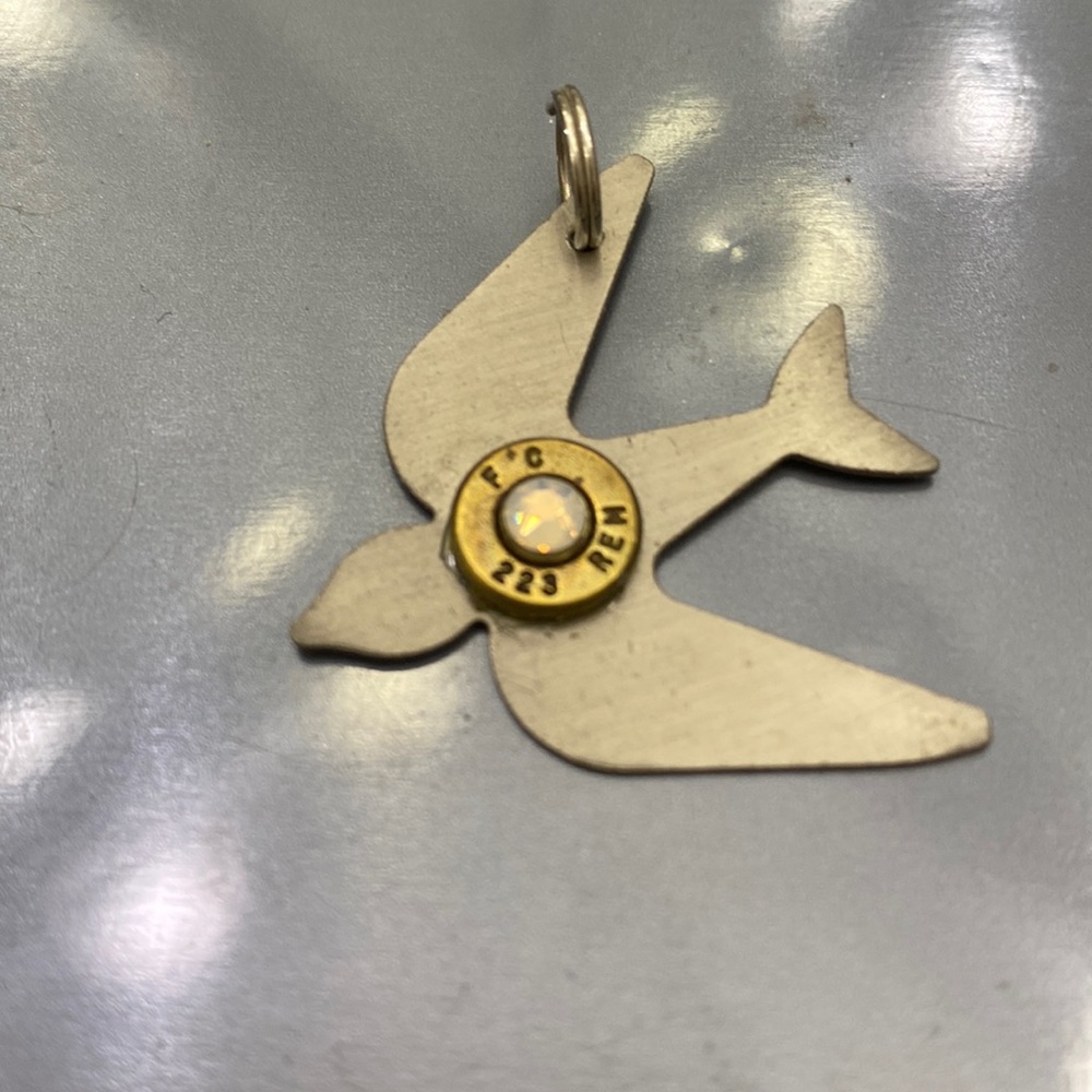 Dove pendant with bullet